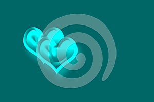 Creative two heart shapes drawn with green glowy color on a green background