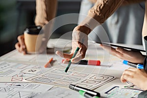 Creative UX UI Design Brainstorming Session with Designers Collaborating on Wireframes and Prototypes