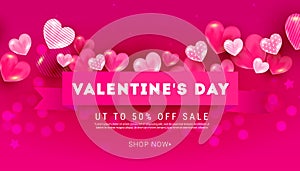 Creative Valentines Day sale banner with 3D volumetric balloon hearts of different sizes and silk ribbon on a bright pink