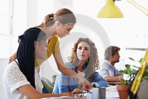 Creative women, training and mentor planning a project in meeting or speaking with leadership in office. Woman coaching