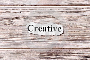 Creative of the word on paper. concept. Words of Creative on a wooden background