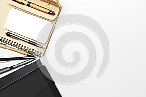 Creative workspace with devices and supplies