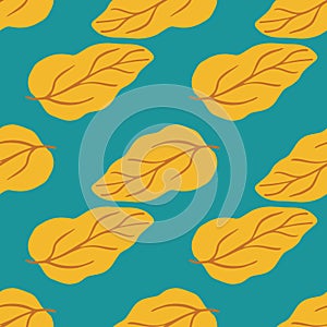 Creative yellow leaves seamless pattern on green background. Simple leaf endless wallpaper