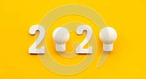 2020 creativity inspiration concepts with text nuber and lightbulb on color background