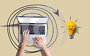 Creativity, inspiration, idea concept with light bulb and laptop computer