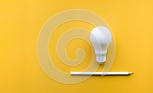 Creativity inspiration,ideas concept with lightbulb and pencil