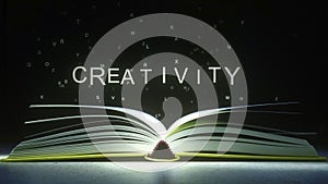 CREATIVITY text made of glowing letters vaporizing from open book. 3D rendering photo