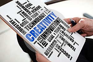 Creativity word cloud concept on a paper