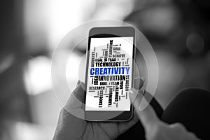 Creativity word cloud concept on a smartphone