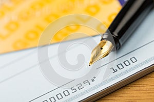 Credit Card with Chequebook and Pen