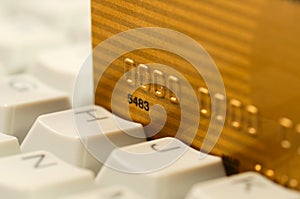 Credit card and computer keyboard. Online shopping