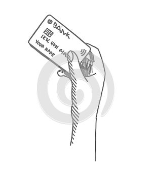 Credit card in a female hand. Sketch hand drawn. Female hand holding bank card. Hatched drawing picture. Gray pencil