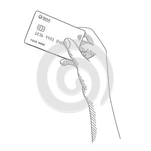 Credit card in a girl hand. Sketch hand drawn. Female hand holding bank card. On white background. Hatched drawing