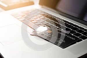 Credit card on Laptop computer payment for purchases from online stores and online shopping. Concept of internet purchase