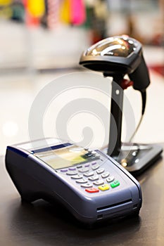 Credit Card Machine on cashier counter in the store