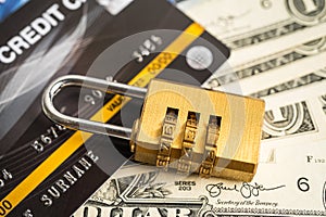 Credit card with password key lock security on US dollar background