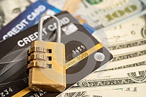 Credit card with password key lock security on US dollar background