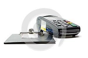 Credit card reader machine and sale slip on white background