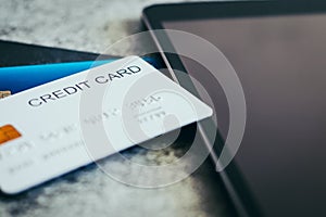 Credit card with tablet. Online shopping and payment