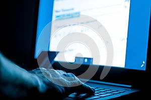 Credit card thief on laptop .