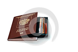 A credit cardholder next to a foreign passport. Payment of tickets for travel