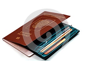 A credit cardholder next to a foreign passport. Payment of tickets for travel