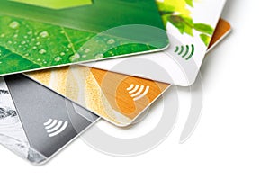 Credit cards with contactless payment. Pile of credit cards on white isolated background