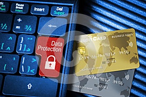 Credit Cards and Keyboard With Red Button Data Protection Concept