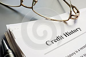 Credit history report papers and pen