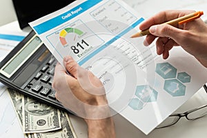 Credit report with score on a desk. High quality photo