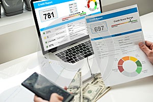 Credit report with score on a desk. High quality photo