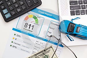 Credit score report with keyboard and pen