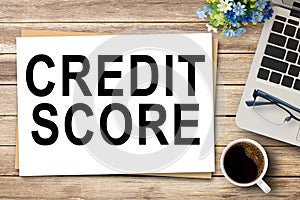 CREDIT SCORE, Text on notebook in office desk workplace background