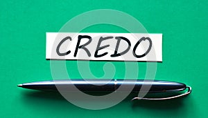 CREDO - word on a green background with a black handle