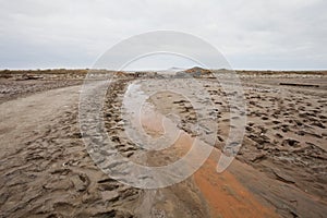 Creek with therapeutic mud near saline Baskunchak