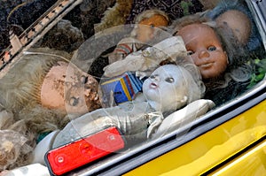 Creepy abandoned children`s dolls