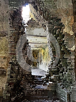Creepy brick opening in an abandoned fort