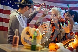 Creepy faces made by party. Woman celebrate Halloween