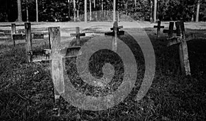 Creepy graveyard with headstone crosses