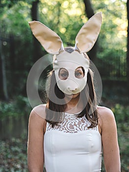 Creepy halloween portrait. Blonde woman in halloween costume.