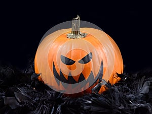 Creepy Halloween Pumpkin on a black background stock images