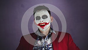 Creepy joker laughing