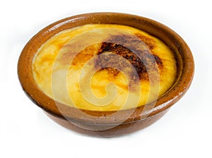 Crema Catalana or Creme Brulee in rustic bowl. Traditional dessert in France and Catalonia. photo