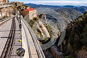 Cremallera train, Montserrat monastery on mountain in Barcelona, Catalonia photo