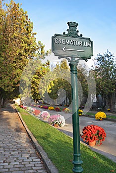Crematorium signpost Pere Lachaise cemetery Paris photo