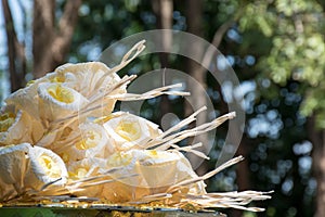 Crematory flowers. Thai artificial flowers used in funerals Wooden flowers to place on the front of the cremation, Thai culture,