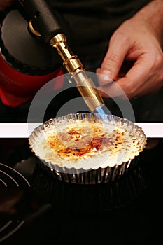 Creme brulee with blowtorch