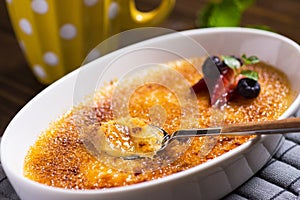 Creme Brulee Dessert with Caramelised Sugar, Strawberry, Blueberry and Fresh Mint Leaves