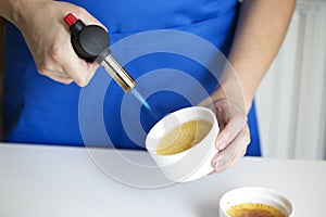 Creme Brulee Dessert Caramelizing Using a Torch