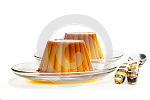 Creme caramel custard pudding isolated in white